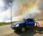 Se reactivan incendios en Canadá; miles de evacuados