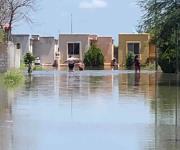 Bloquean carretera a San Fernando por inundación en Pirámides