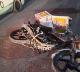 Repartidor motociclista lesionado en choque